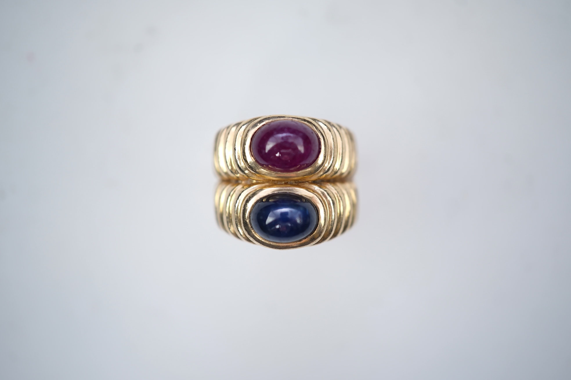A sapphire and ruby ring